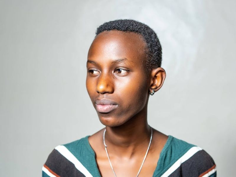 Minimalist exercise studio with soft teal lighting